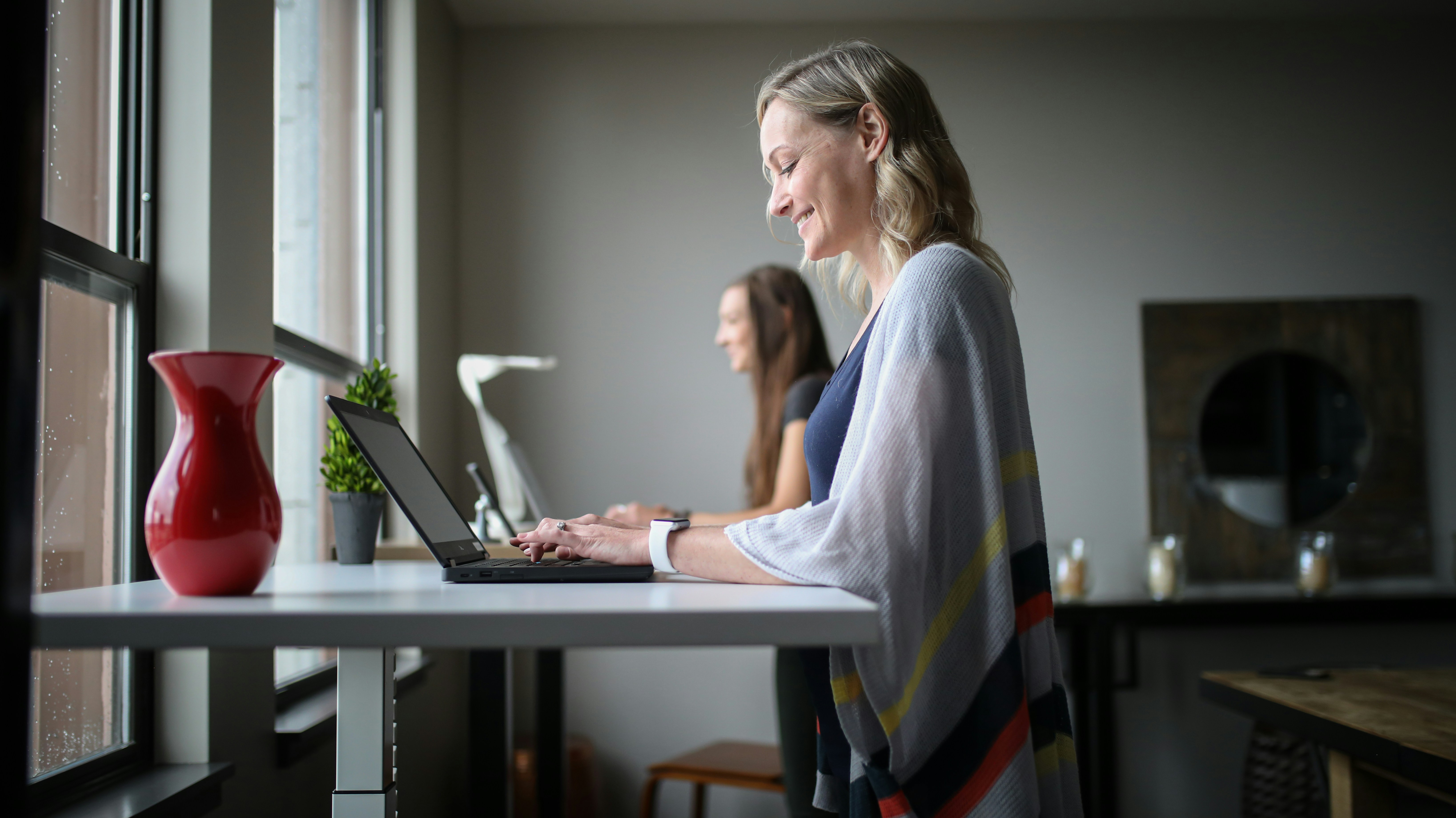 Professional working at standing desk